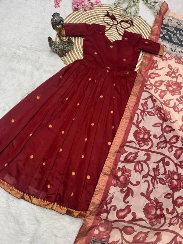 This_gown_made_from_jJacquard_weaving_zari_butti_fabric_And_soft_silk_Duppatta_with_zari_border