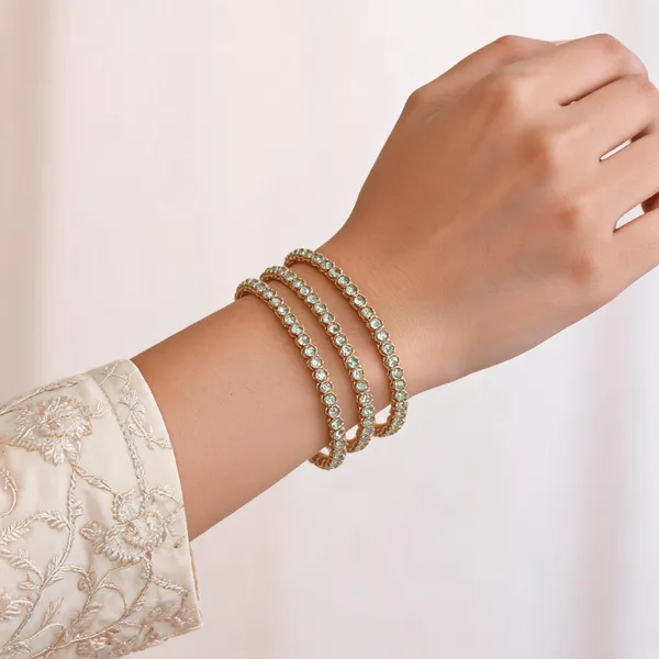 Gold_Metal_Shimmering_Stone_Studded_Bangles_For_Women