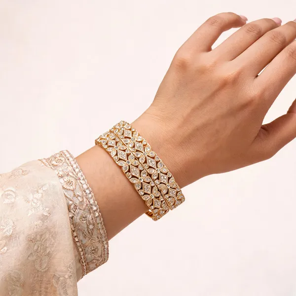 Gold_Metal_Floral_Cutwork_Stone_Studded_Bangles_For_Women