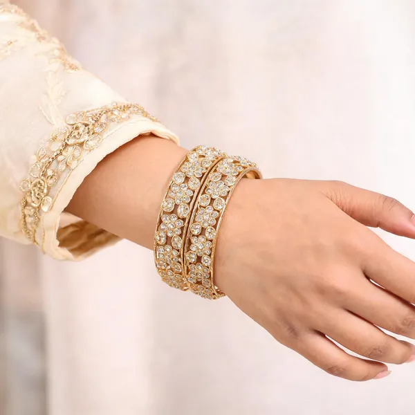 Gold_Metal_Floral_Cutwork_White_Stone_Bangles_For_Women
