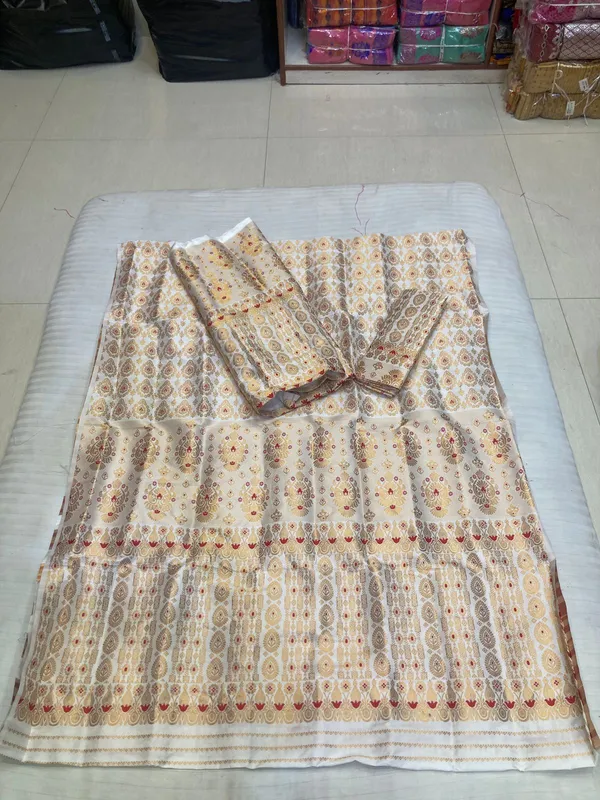 Cream_Cotton_Bridal_Embroidered_Mekhela_Sador_Riha_Set_For_Women