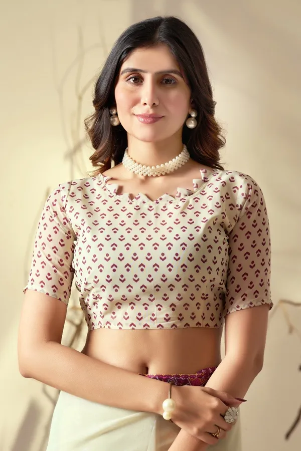 Cream_And_Pink_Georgette_Geometric_Printed_Tassel_Border_Saree_For_Women