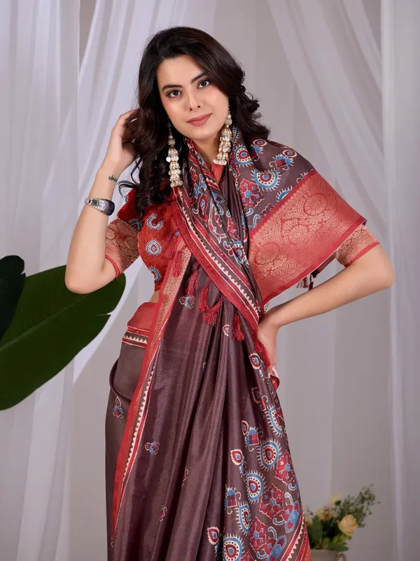 Brown_And_Red_Lichi_Silk_Ethnic_Motif_Printed_Woven_Border_Saree_For_Women