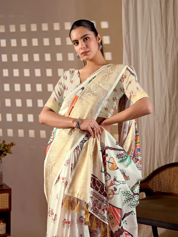 Cream_Lichi_Silk_Village_Art_Printed_Woven_Border_Saree_For_Women