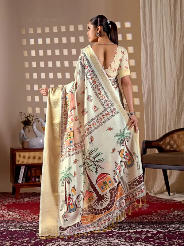 Cream_Lichi_Silk_Village_Art_Printed_Woven_Border_Saree_For_Women