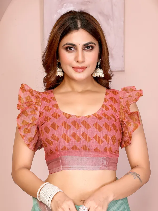 Refreshing_Mint_Green_Linen_Cotton_Saree_with_Pink_Floral_Prints