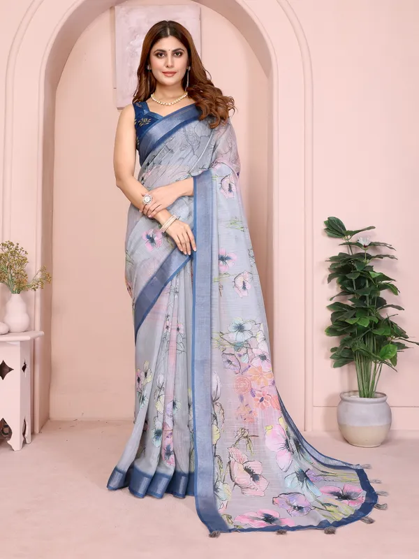 Elegant_Steel_Blue_Linen_Cotton_Saree_with_Pastel_Floral_Prints