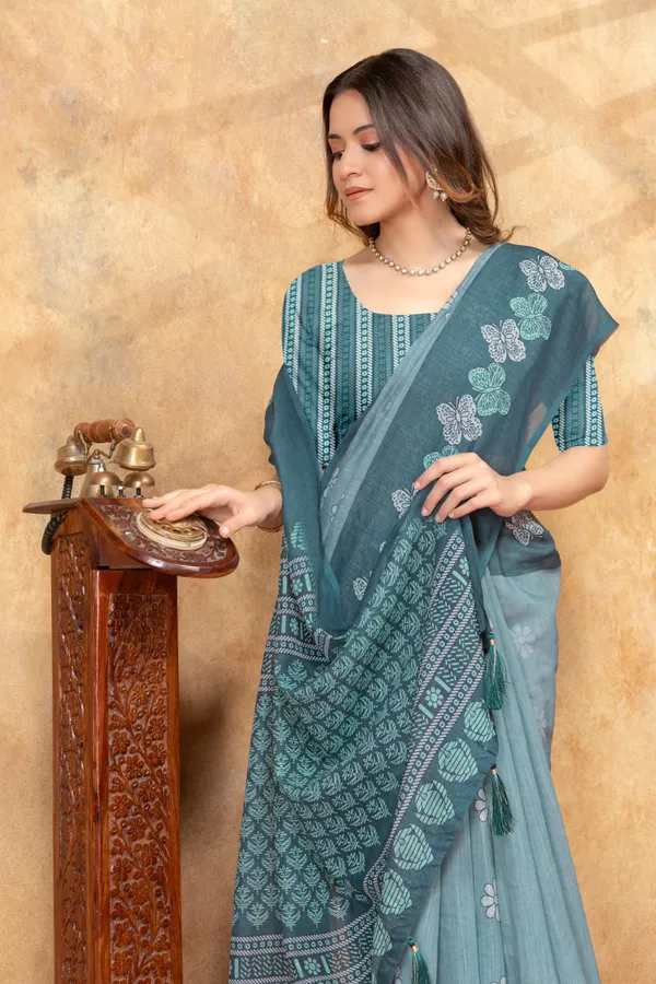 Teal_Blue_Floral_Printed_Linen_Shimmer_Saree_with_Ethnic_Border