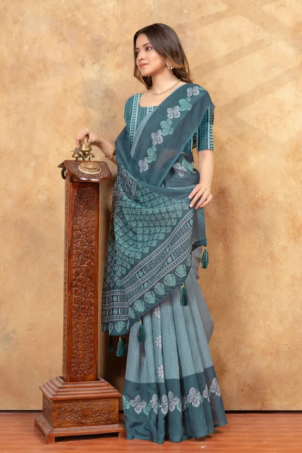 Teal_Blue_Floral_Printed_Linen_Shimmer_Saree_with_Ethnic_Border