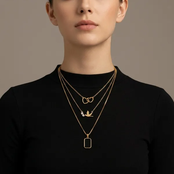 Gold_Alloy_Interlocked_Hearts_Bird_Charm_Pendant_Necklace_Set_For_Women_Set_Of_3