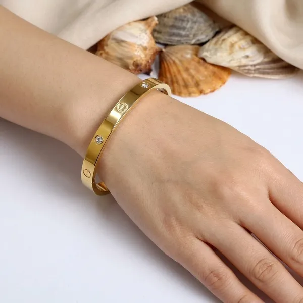 Gold_Alloy_Screw_Design_Bangle_Bracelet_For_Women