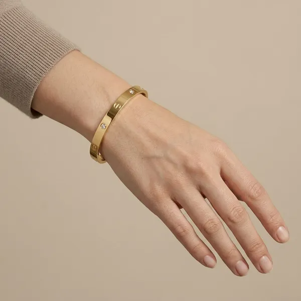 Gold_Alloy_Screw_Design_Bangle_Bracelet_For_Women