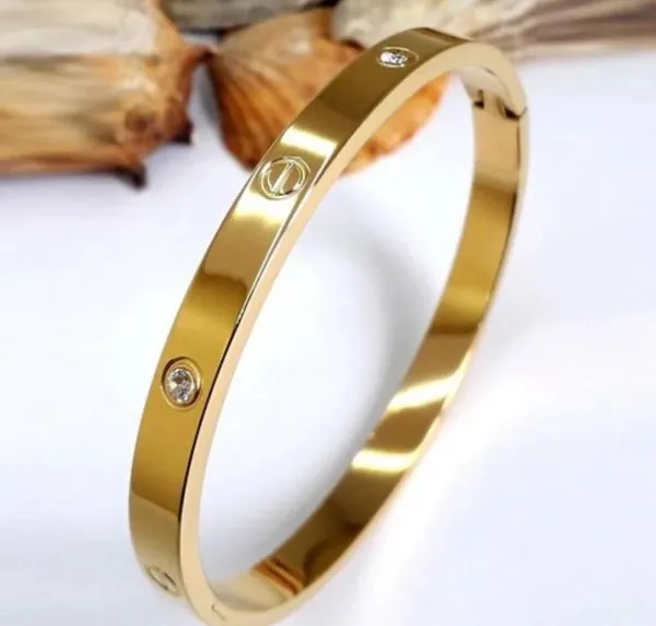 Gold_Alloy_Screw_Design_Bangle_Bracelet_For_Women