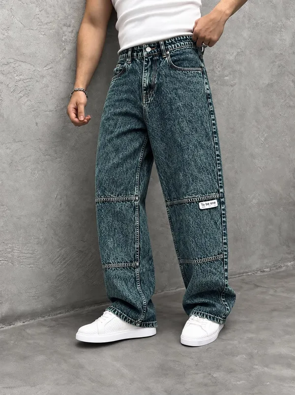 UNCLEAR_RELAXED_FIT_DENIM_PISTA_GREEN