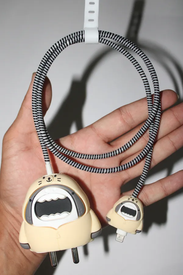 Silicone_Cable_Protector_Cat_Face_Design_Charger_Off_White_Set_Of_4-_Only_for_Iphone_(18-20_Watt_Charger)