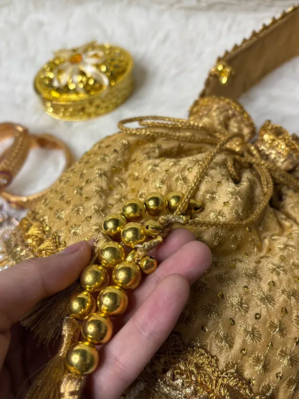 Golden_Handcrafted_Ghungroo_Potli_Bag_With_Premium_Tassels