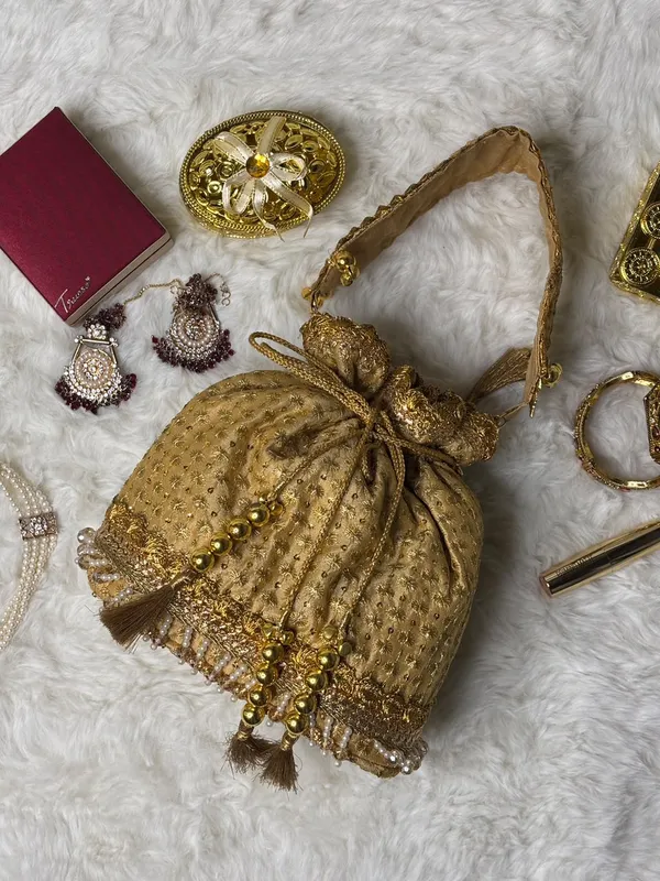 Golden_Handcrafted_Ghungroo_Potli_Bag_With_Premium_Tassels