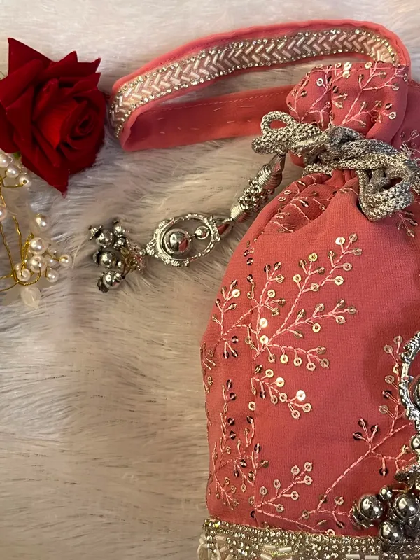 Pastel_Pink_Handcrafted_Embroidery_Potli_Bag