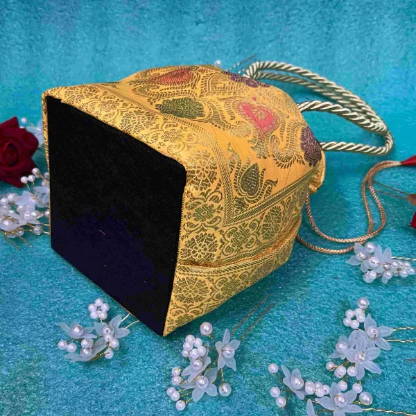 Yellow_Banarasi_Silk_Brocade_Braided_Handle_Potli_Bag_For_Women