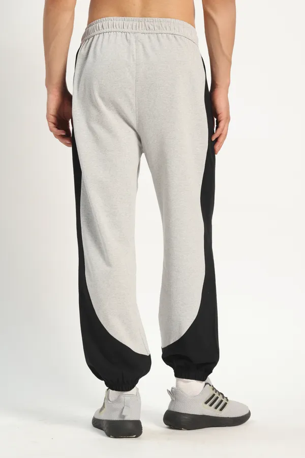 HYPE_BORN__Grey_Melange_&_Black_Color_Block_Sweatpants_with_Elastic_Cuffed_Hem