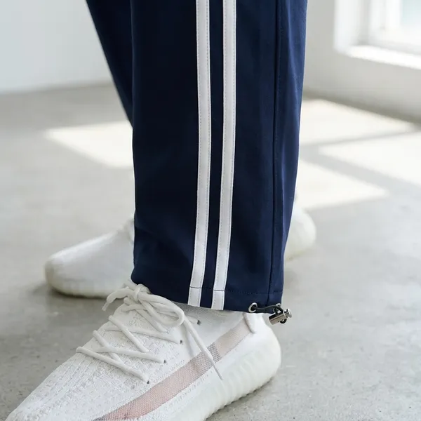 COISTICH_Navy_Blue_Edge_Relaxed_Fit_Track_Pants_With_Side_Stripe_&_Adjustable_Anklet