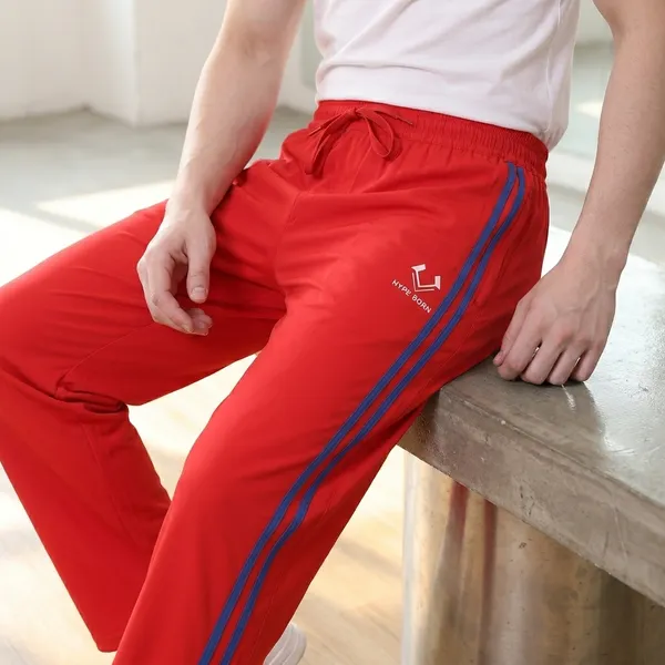 HYPE_BORN_Red_&_Royal_Blue_Lightweight_Regular_Fit_Track_Pants_with_Side_Stripes_&_Drawstring_Waist