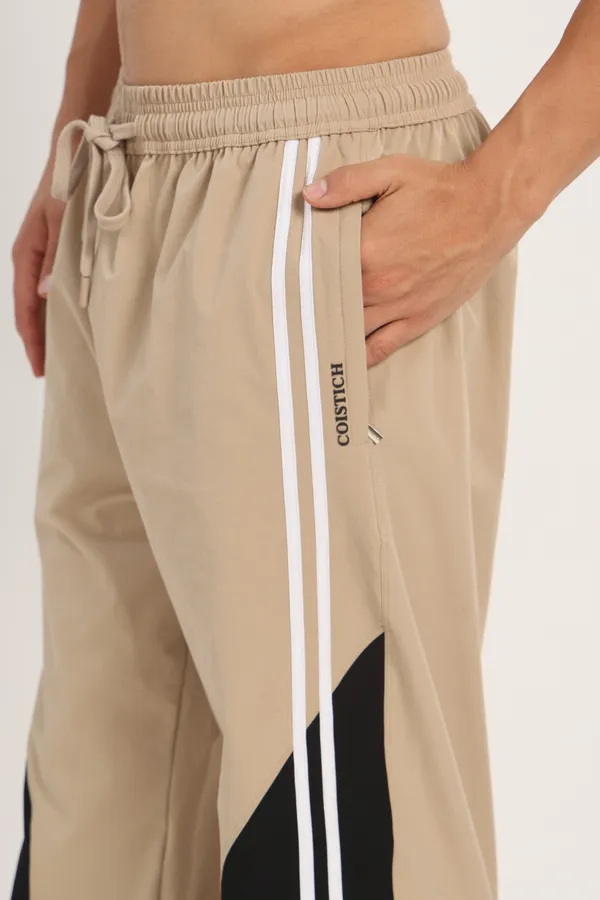 COISTICH_Beige_Color_Block_Track_Pants_with_2_Side_Stripes_&_Adjustable_Anklet_Closure