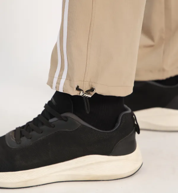 COISTICH_Beige_Color_Block_Track_Pants_with_2_Side_Stripes_&_Adjustable_Anklet_Closure