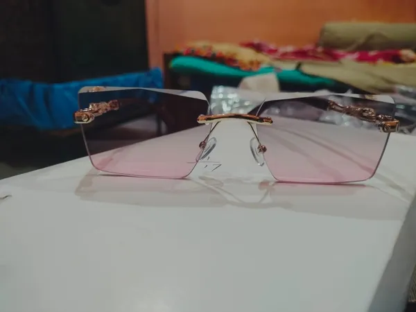 Pink_Tinted_Rimless_Rectangular_Sunglasses