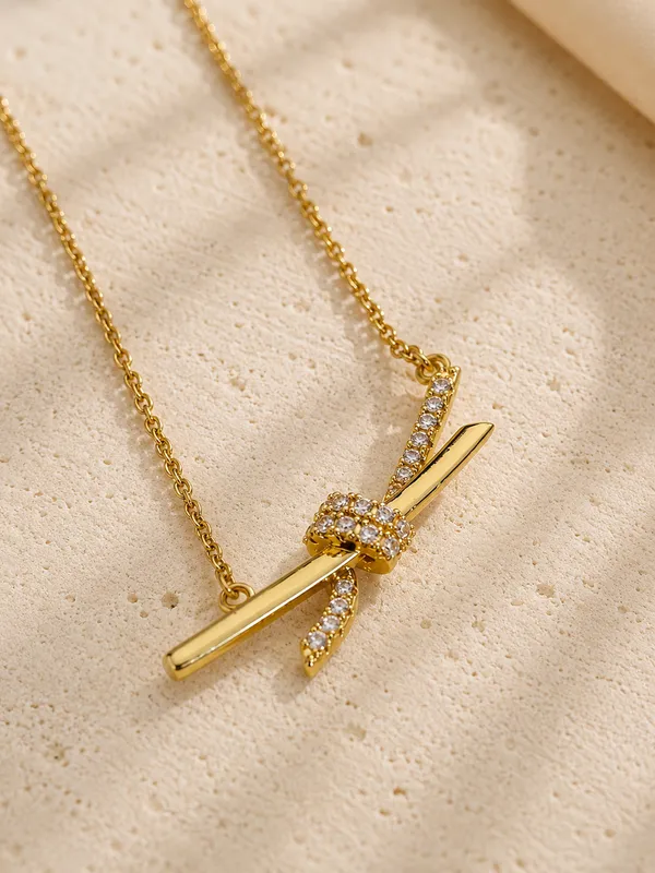 Gold_Tone_Crystal_Embellished_Knot_Design_Pendant_Necklace