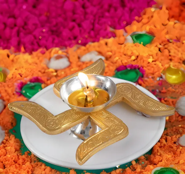 Xenoncraft_Swastik_Brass_Akhand_Diya_With_Velvet_Box_For_Puja,_Diwali_&_Housewarming_Gift_Decorative_Showpiece_-_4.5_Cm_(Silver_Plated,_Gold_Plated,_Gold,_Silver)