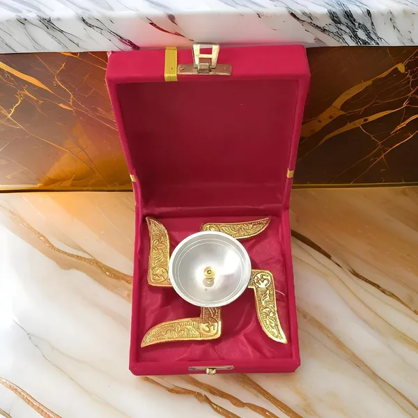 Xenoncraft_Swastik_Brass_Akhand_Diya_With_Velvet_Box_For_Puja,_Diwali_&_Housewarming_Gift_Decorative_Showpiece_-_4.5_Cm_(Silver_Plated,_Gold_Plated,_Gold,_Silver)