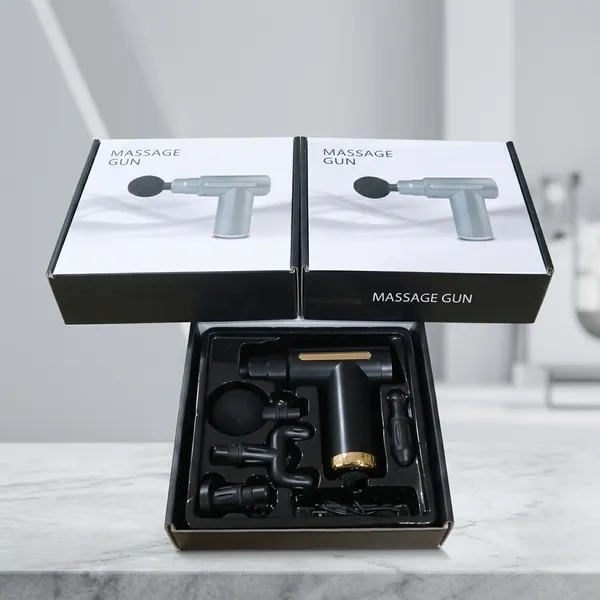 Percussion_Massage_Gun_With_Multiple_Attachments