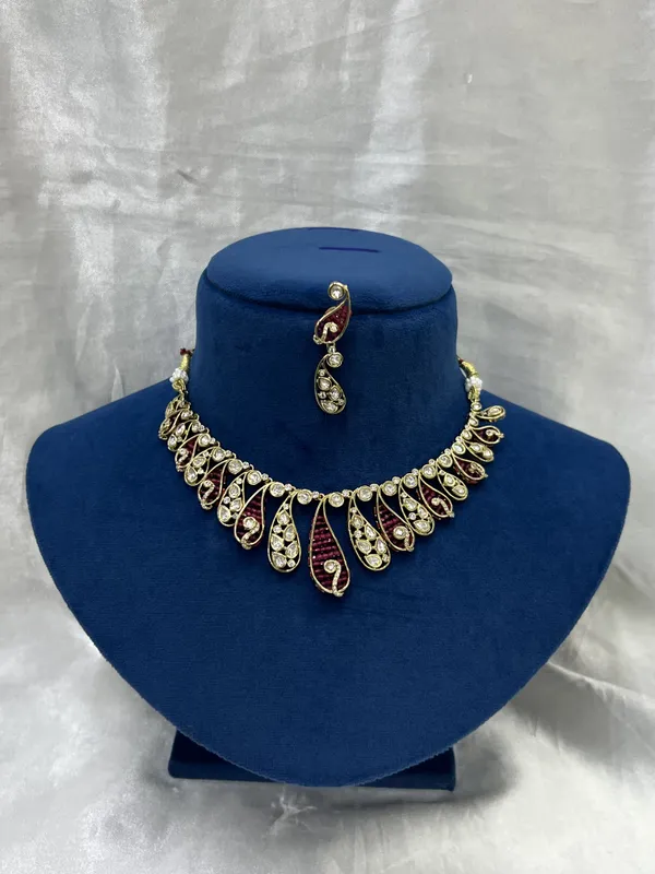 Golden_Maroon_Stone_Embellished_Statement_Necklace_Set_for_Women