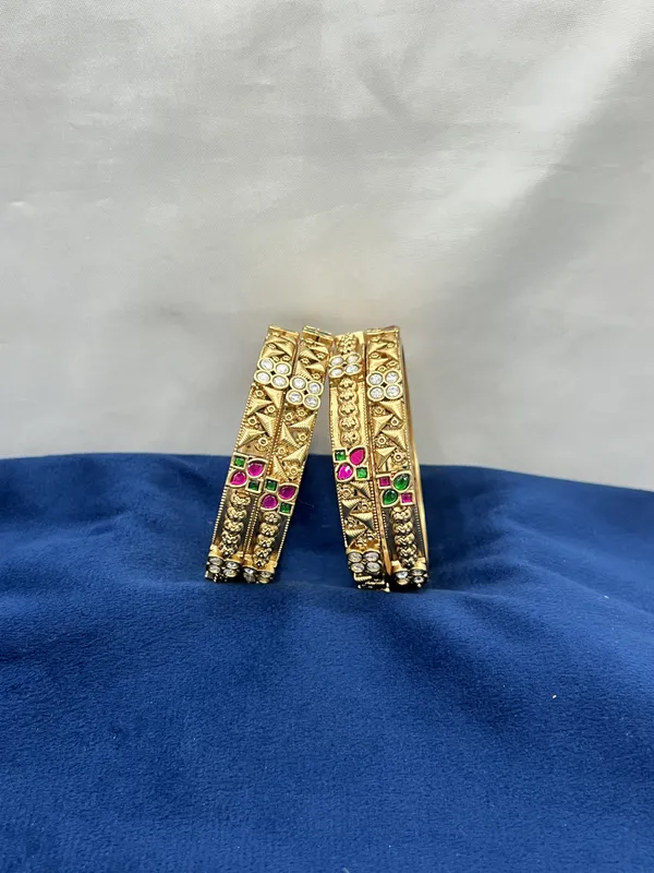 Golden_Floral_Embossed_Bangles_with_Pink_and_Green_Stones