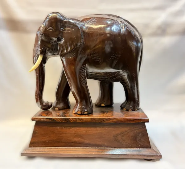 Solid_Rosewood_Elephant_Statue_with_Wooden_Base_–_Handcrafted_Indian_Hardwood_Animal_Sculpture_for_Living_Room_&_Office_Decor