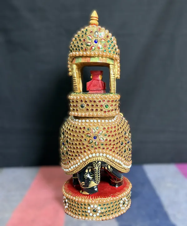Handcrafted_Royal_Wooden_Ambari_Elephant_with_Pillared_Pavilion_&_Peacock_Canopy_–_Pearl_&_Gemstone_Procession_Centerpiece