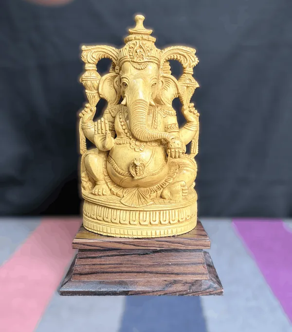 Hand-Carved_Kadam_Wood_Ganesha_Idol_with_Temple_Prabhavali_on_Dark_Hardwood_Base_Vastu_&_Mandir_Decor