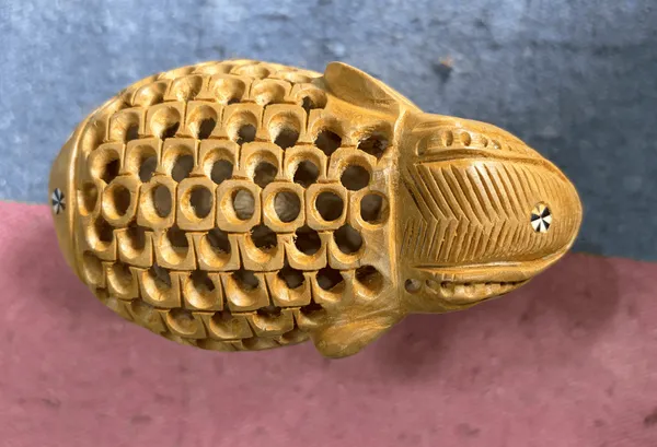 Hand-Carved_Kadam_Wood_Undercut_Elephant_with_Baby_Inside_Single-Block_Jali_Openwork_Fretwork_Showpiece_Maternal_Vastu_Decor
