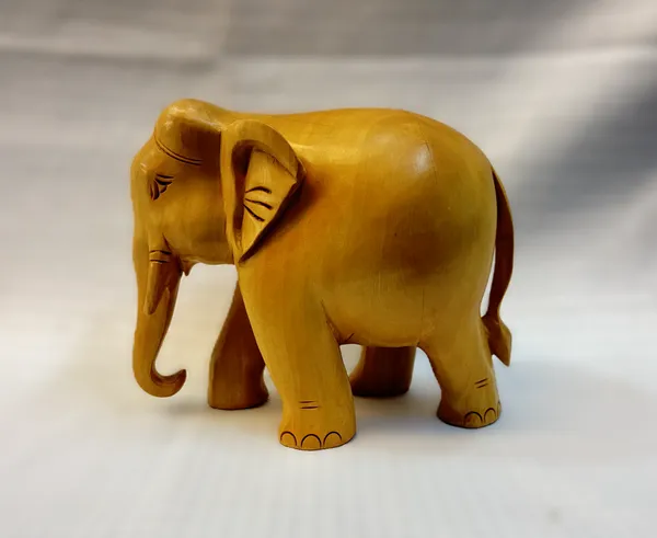 Hand-Carved_Natural_Blonde_Wood_Elephant_Smooth_Minimalist_Timber_Sculpture_for_Modern_Desk_&_Bookshelf_Decor
