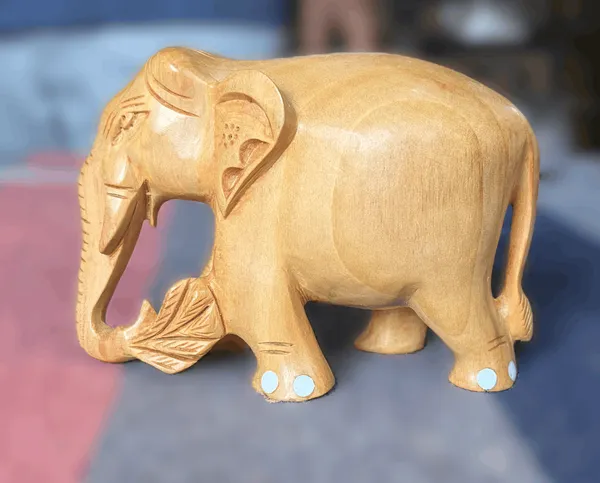 Hand-Carved_Natural_Wood_Elephant_Holding_Leaf_Branch_Solid_Kadam_Timber_Wildlife_Desktop_Figurine