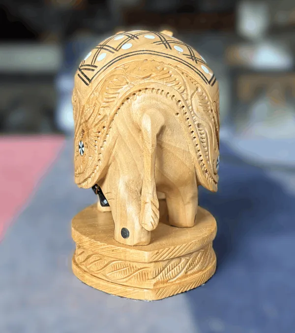 Hand-Carved_Wooden_Elephant_with_Inlay_Work_Studded_Diamond_Trellis_&_Hanging_Underbelly_Bell_Showpiece_Tabletop_Decor