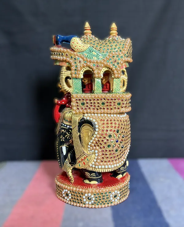 Handcrafted_Royal_Wooden_Ambari_Elephant_with_Pillared_Pavilion_&_Peacock_Canopy_–_Pearl_&_Gemstone_Procession_Centerpiece