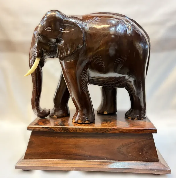 Solid_Rosewood_Elephant_Statue_with_Wooden_Base_–_Handcrafted_Indian_Hardwood_Animal_Sculpture_for_Living_Room_&_Office_Decor