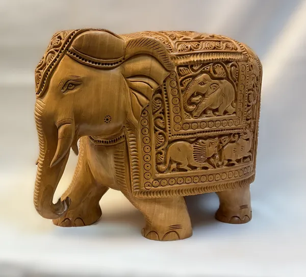 Masterpiece_Hand-Carved_Solid_Wood_Elephant_with_Detailed_Wildlife_Panels_Natural_Timber_Bas-Relief_Centerpiece