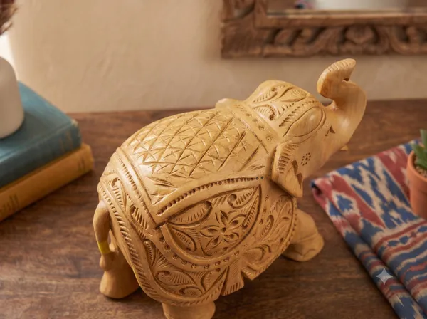 Hand-Carved_Kadam_Wood_Elephant_with_Upturned_Trunk_–_Traditional_Floral_Relief_Vastu_Showpiece