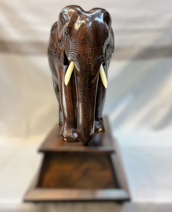 Solid_Rosewood_Elephant_Statue_with_Wooden_Base_–_Handcrafted_Indian_Hardwood_Animal_Sculpture_for_Living_Room_&_Office_Decor