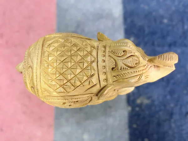 Hand-Carved_Kadam_Wood_Elephant_with_Upturned_Trunk_–_Traditional_Floral_Relief_Vastu_Showpiece