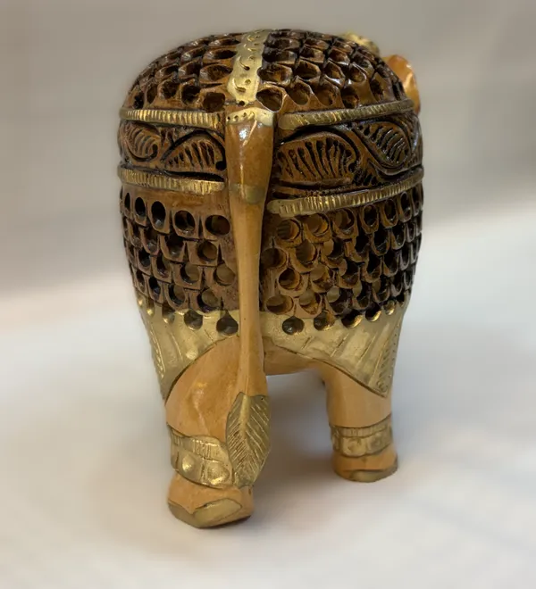 Hand-Carved_Undercut_Wooden_Elephant_with_Antique_Patina_Detailing_&_Baby_Inside_–_Single-Block_Jali_Fretwork_Sculpture