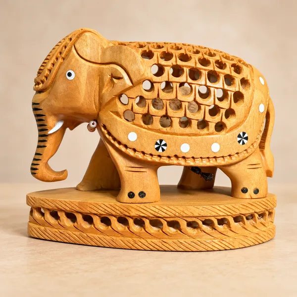 Hand-Carved_Kadam_Wood_Undercut_Elephant_with_Baby_Inside_–_Single-Block_Jali_Openwork_Fretwork_Showpiece_–_Maternal_Vastu_Decor